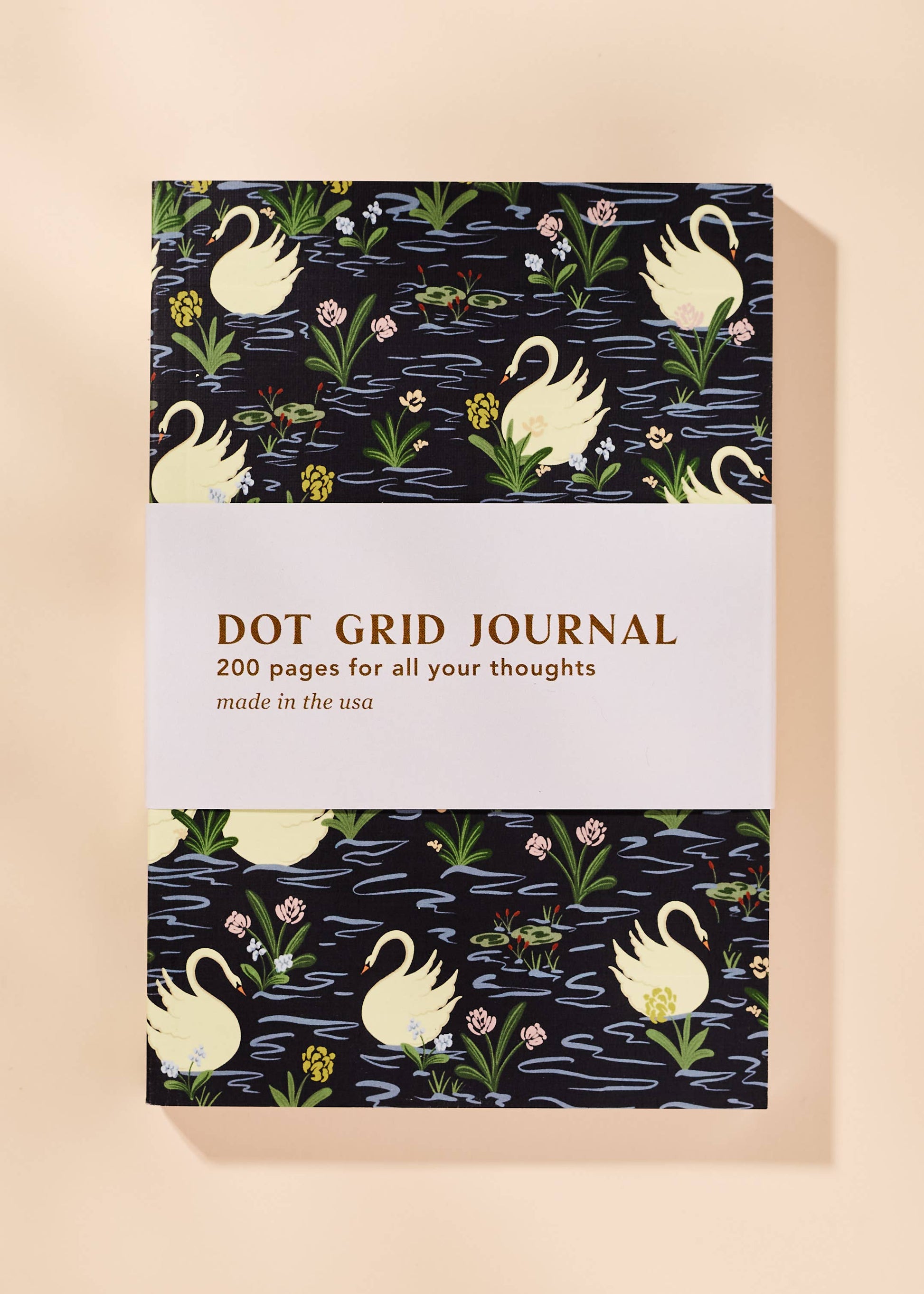 Dot grid journal with swan design on cover