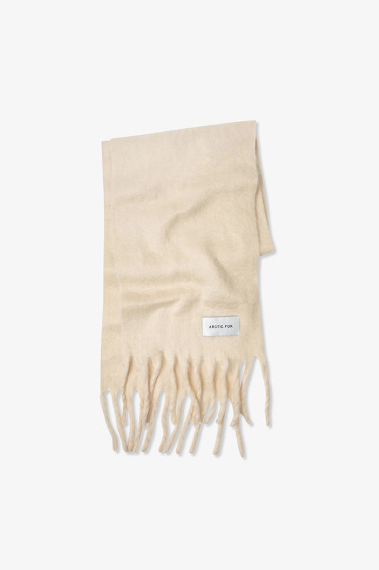 Beige scarf with fringes on a white background