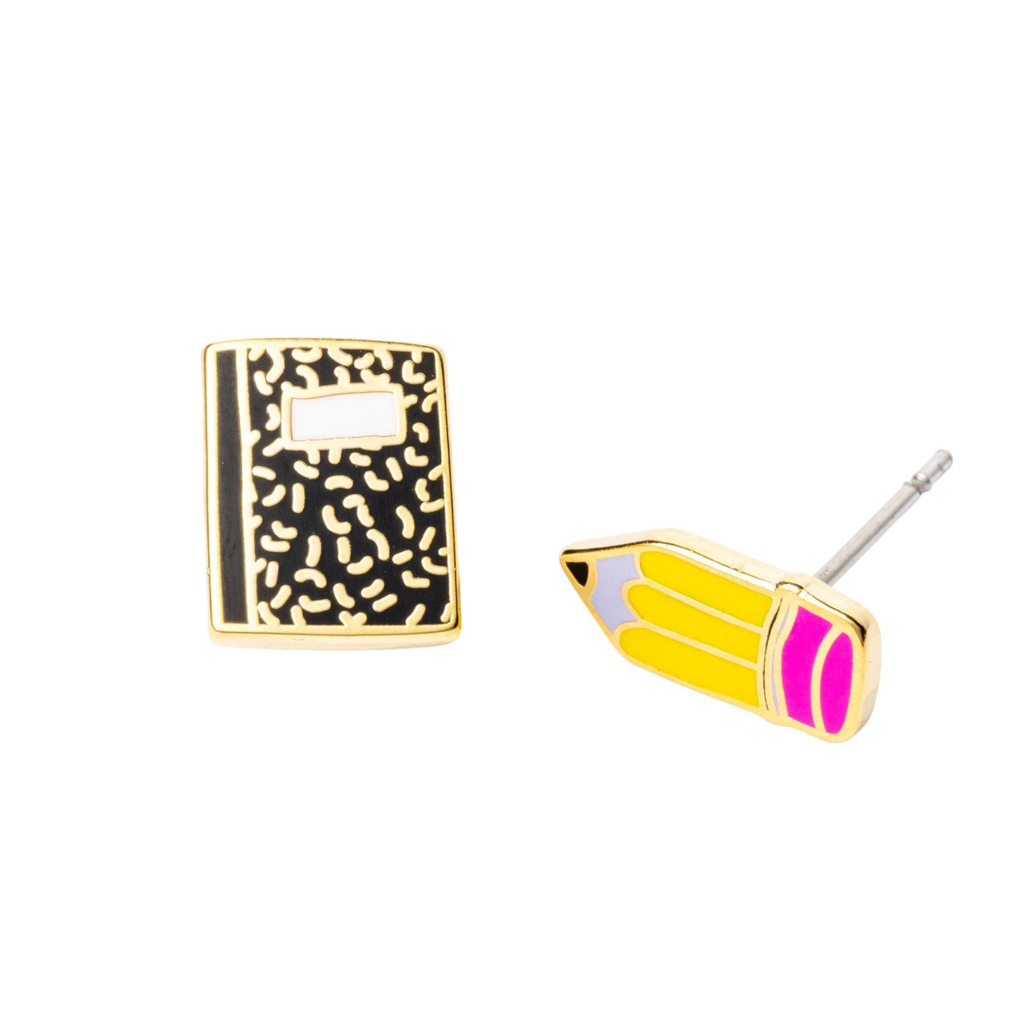 A pair of novelty stud earrings on a white background, featuring a black and gold patterned notebook stud and a gold-plated pencil stud with yellow, pink, and white enamel.