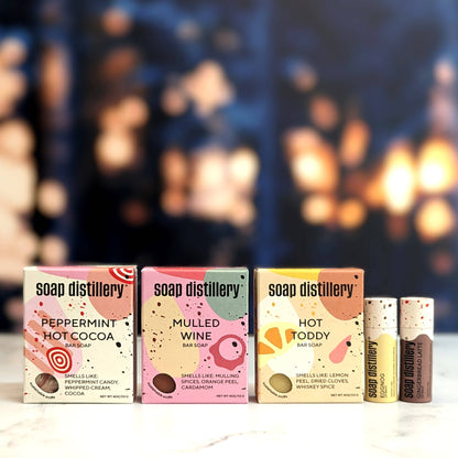 Soap distillery product packaging with various scents on a blurred background, Peppermint Hot Cocoa Bar Soap