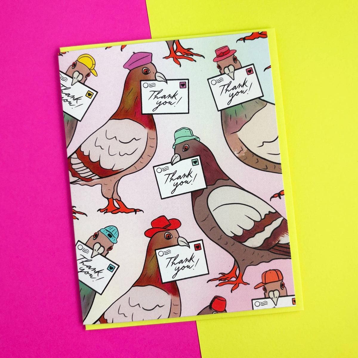 Card with cartoon pigeons wearing hats and holding 'Thank you' notes on a pink and yellow background