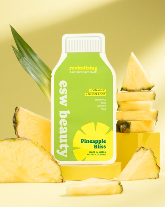 Esw Beauty Pineapple Bliss face mask with pineapple slices on a yellow background
