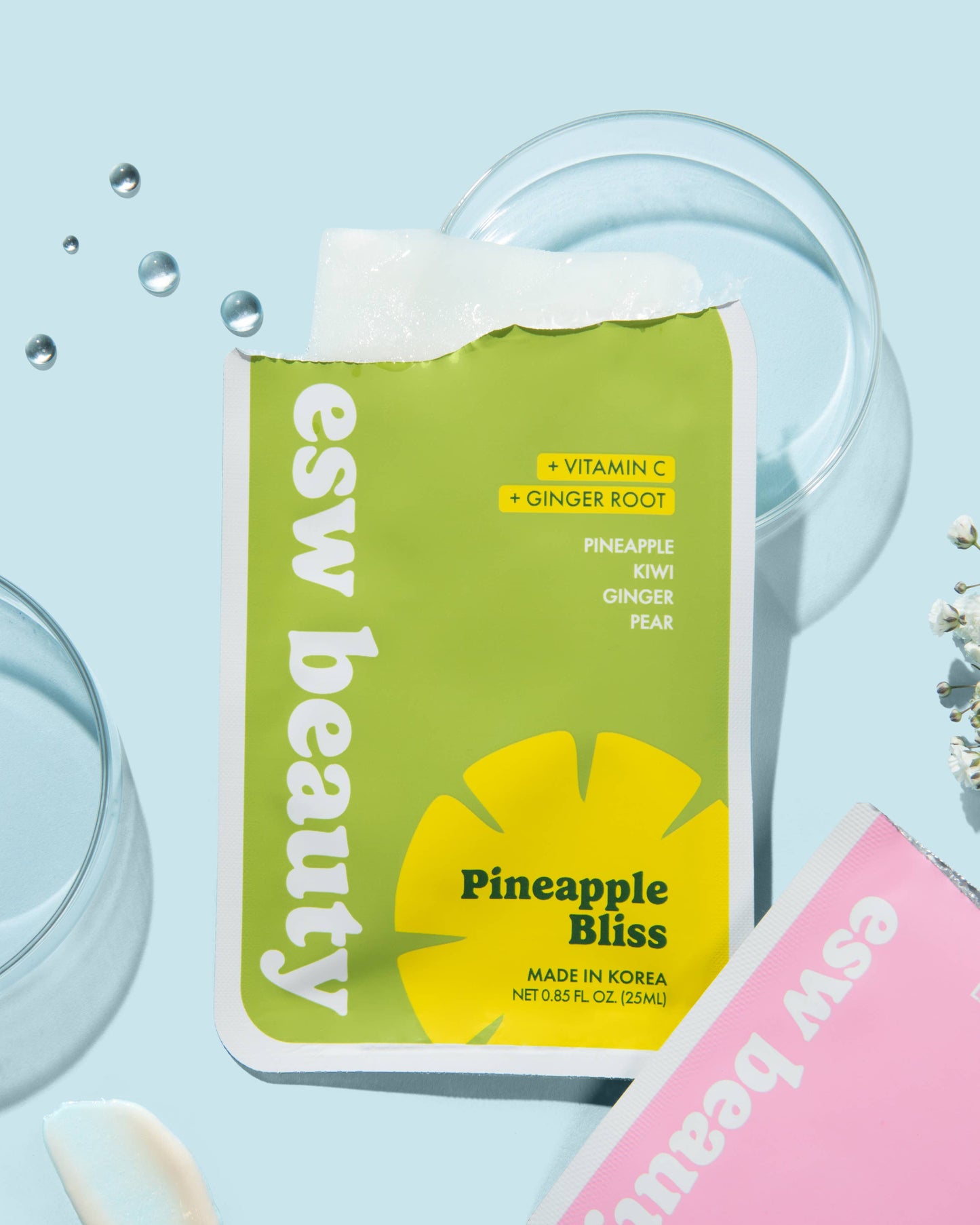 Esw Beauty Pineapple Bliss skincare product packaging on a light blue background