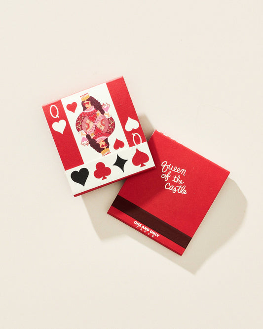 Red card deck with 'Queen of the Castle' design on a beige background