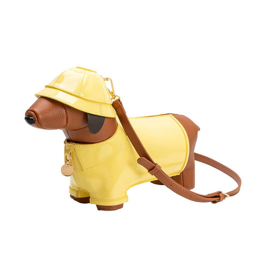 Dog-shaped bag with a yellow raincoat and hat on a white background