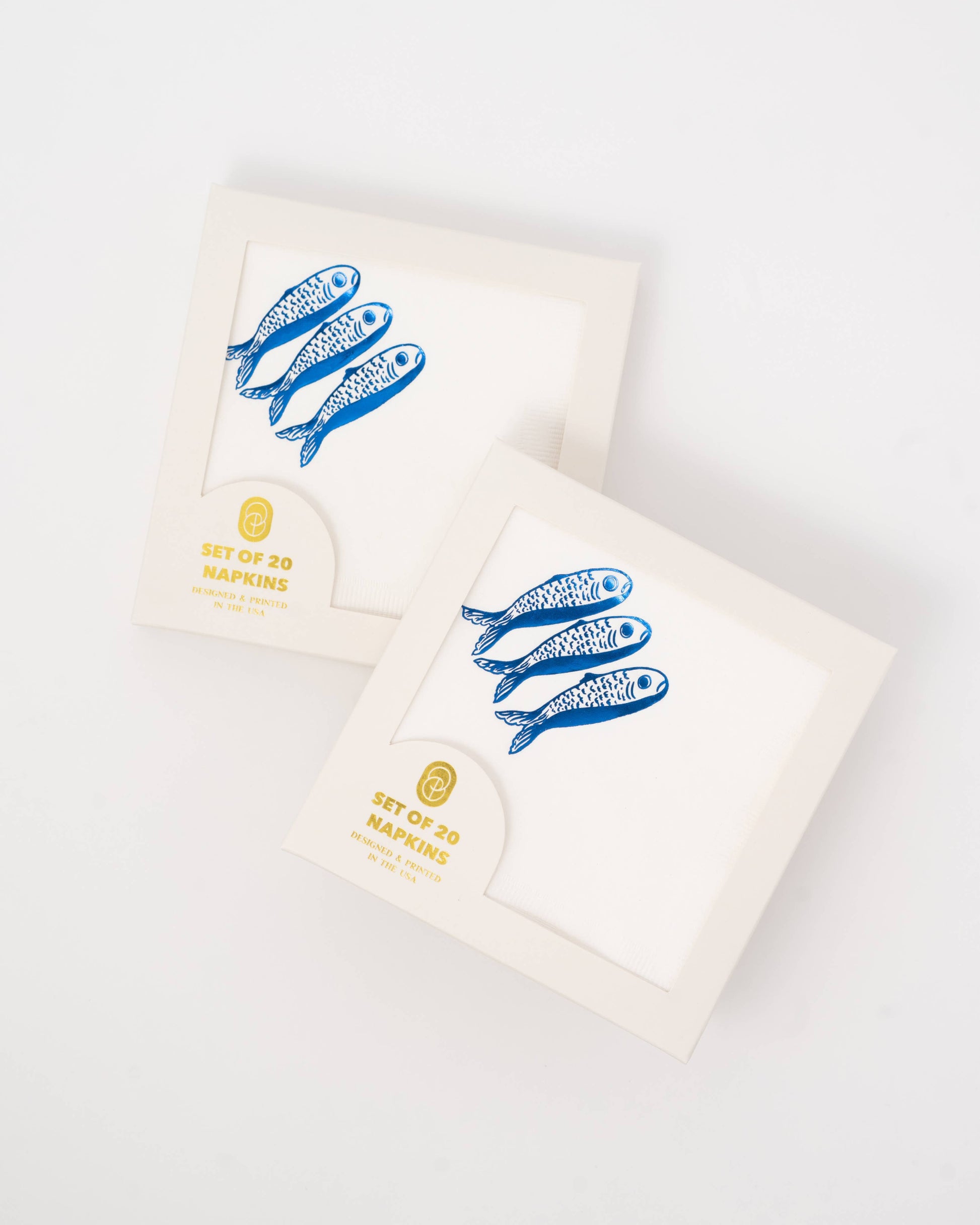 Two boxes with blue fish illustrations and gold text on a white background