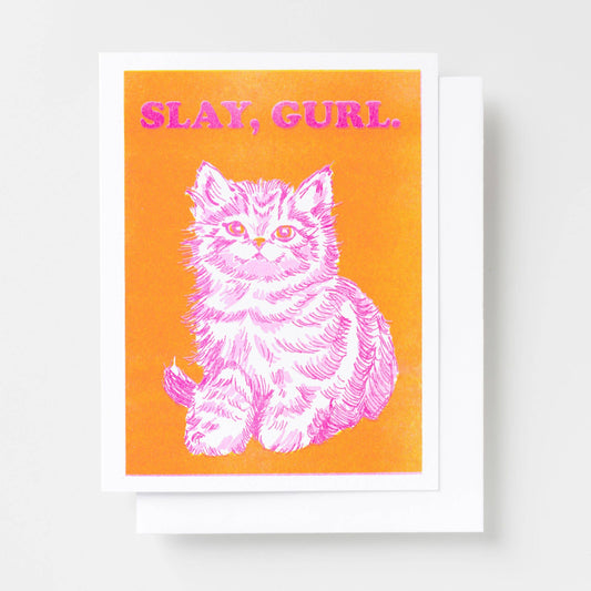Framed print with a pink cat illustration and 'Slay, Gurl' text on an orange background