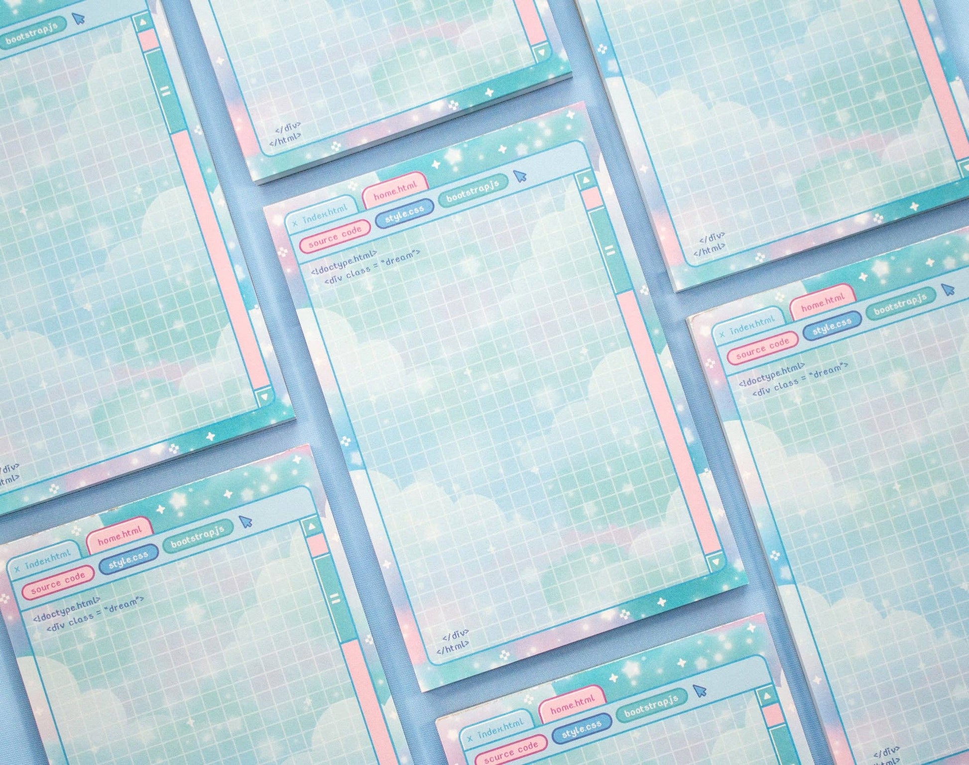 Pastel-colored card designs with cloud patterns on a matching background