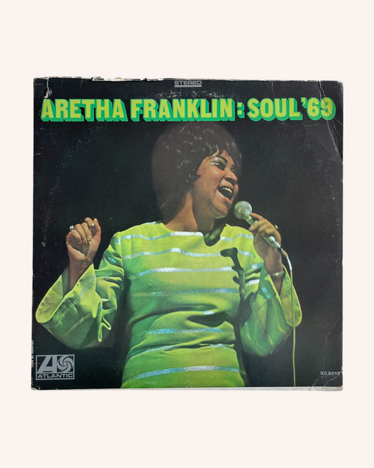 Vinyl record cover featuring Aretha Franklin with text 'Aretha Franklin: Soul '69' on a black background. Soul '69 Vinyl Record - Aretha Franklin