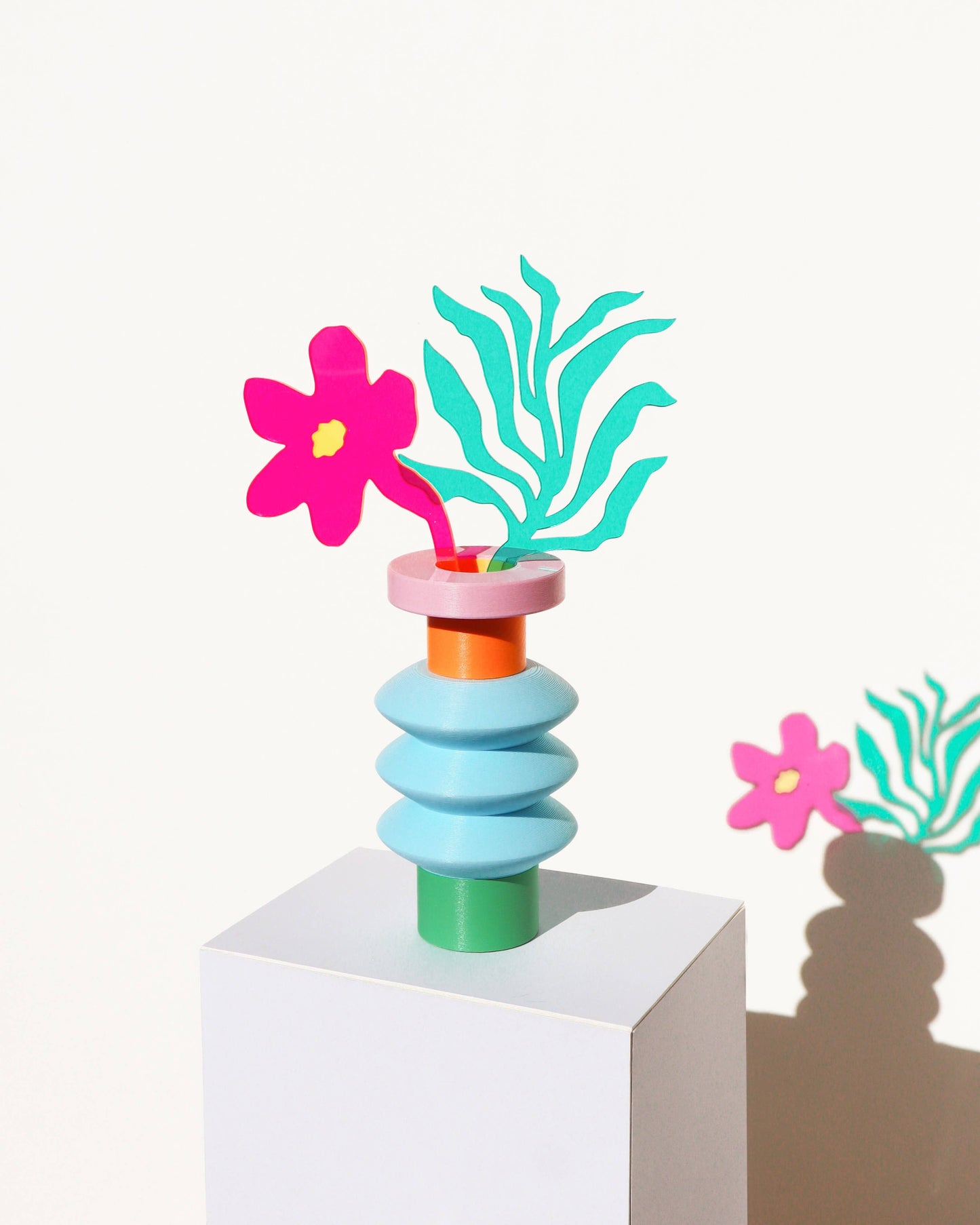 Space Color Block Vase with flowers in it