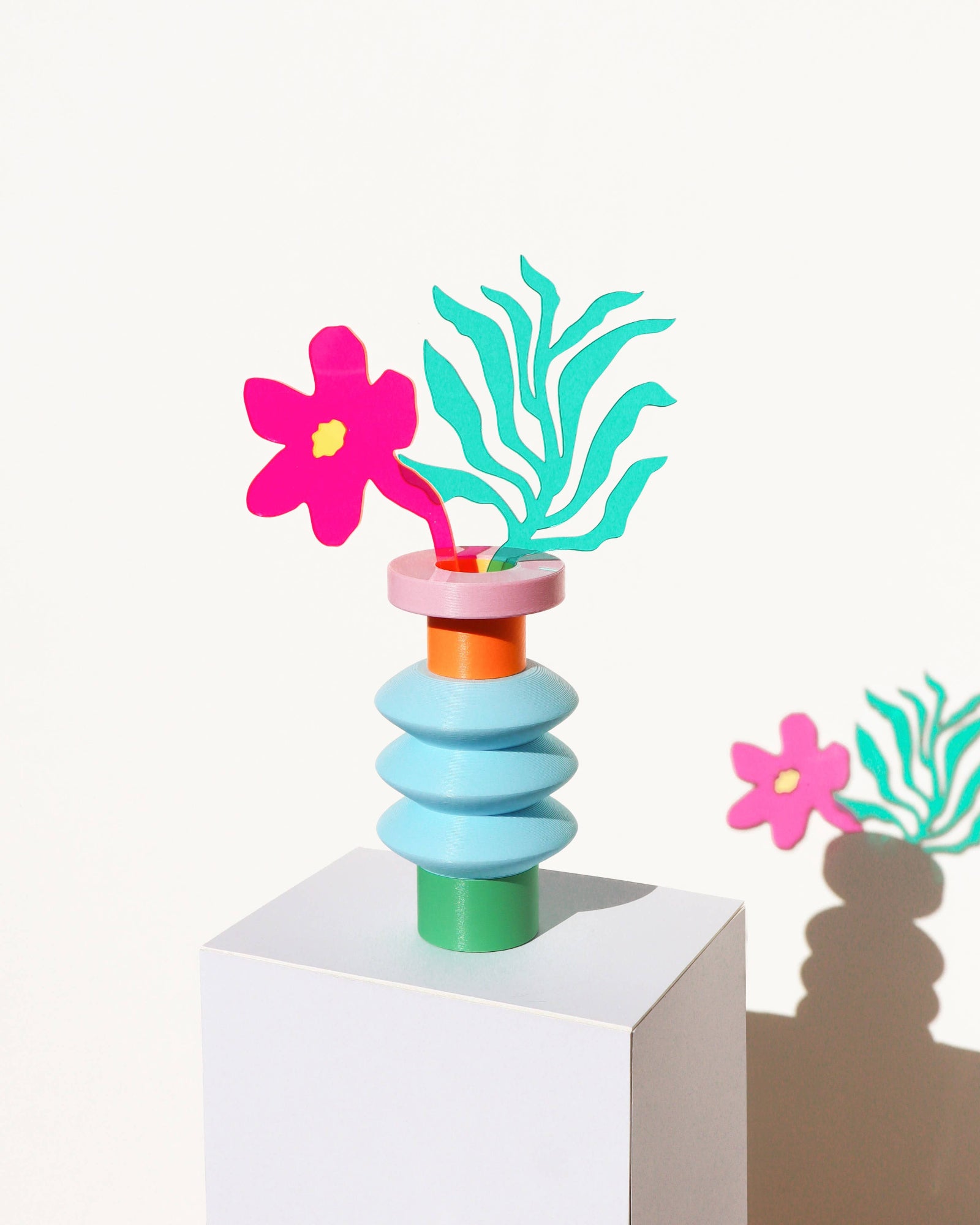 Space Color Block Vase with flowers in it