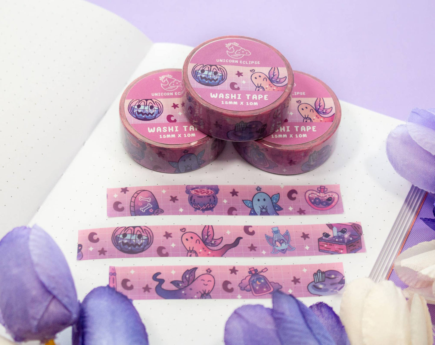 Washi tape with cartoon designs on a white surface