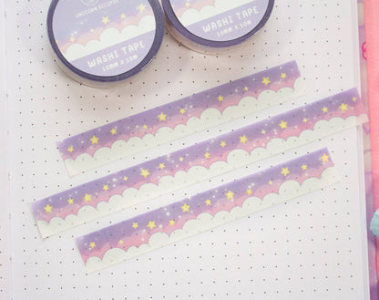 Washi tape with cloud and star design on a white surface