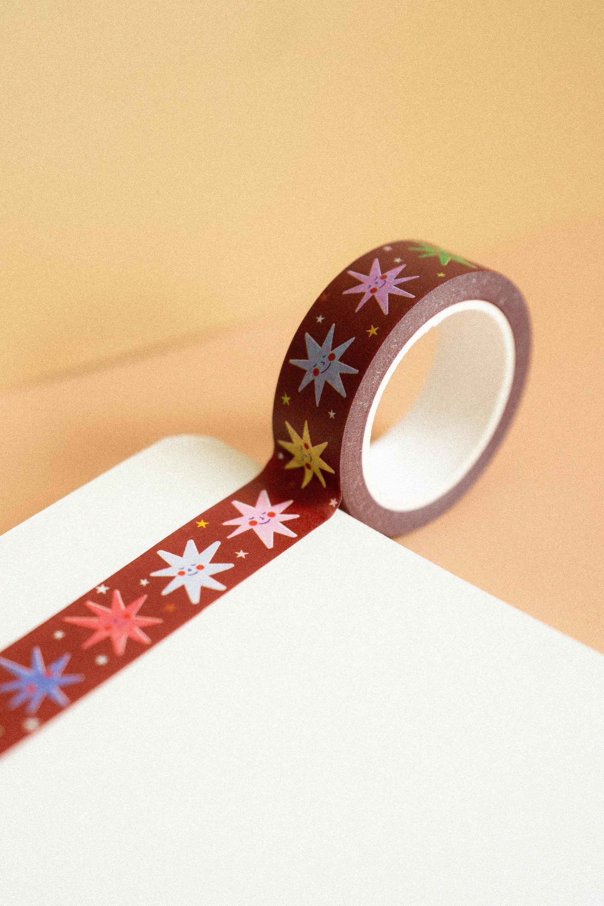 Decorative tape with star patterns on a beige background