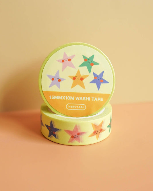 Two rolls of washi tape with star designs on a beige background, Stellar Washi Tape