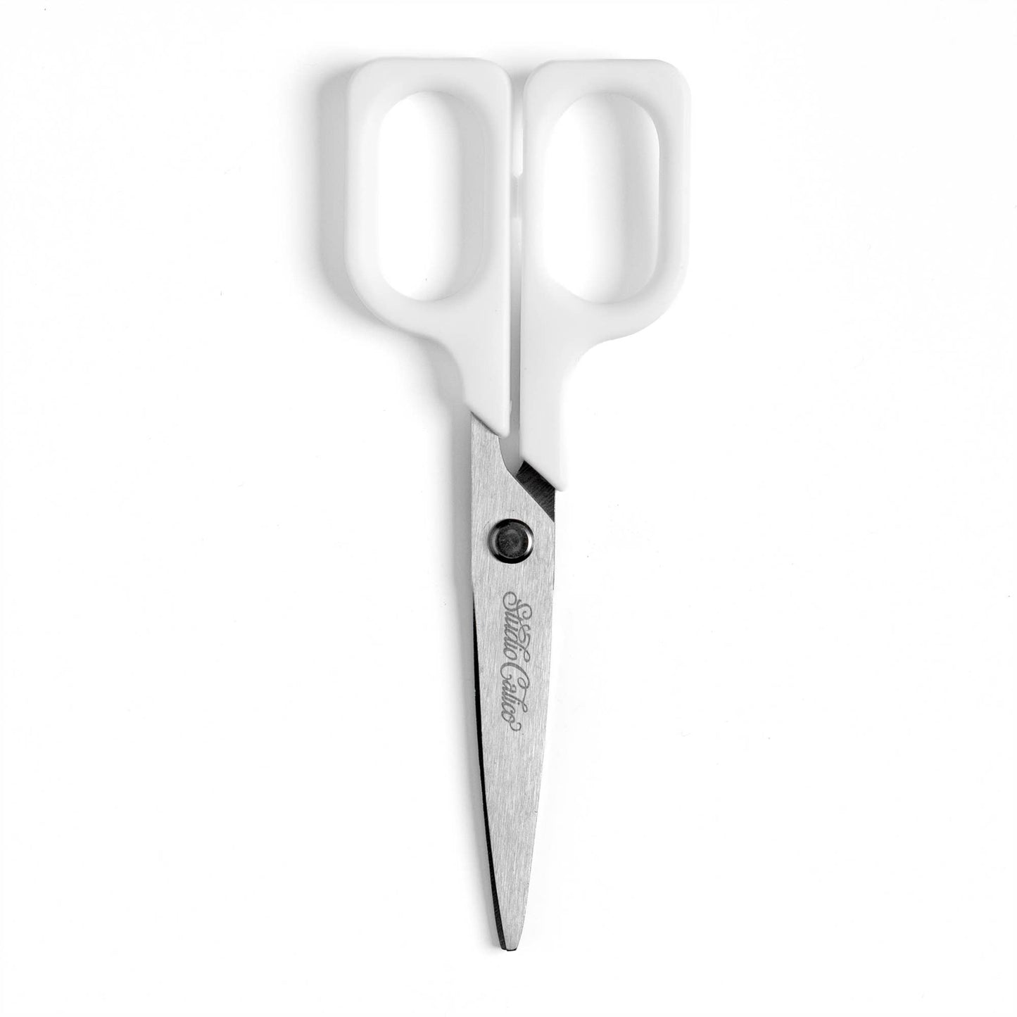 White-handled scissors with silver metal blades, shown against a plain white background. The brand name 'Bergdorf' is engraved on the blade.
