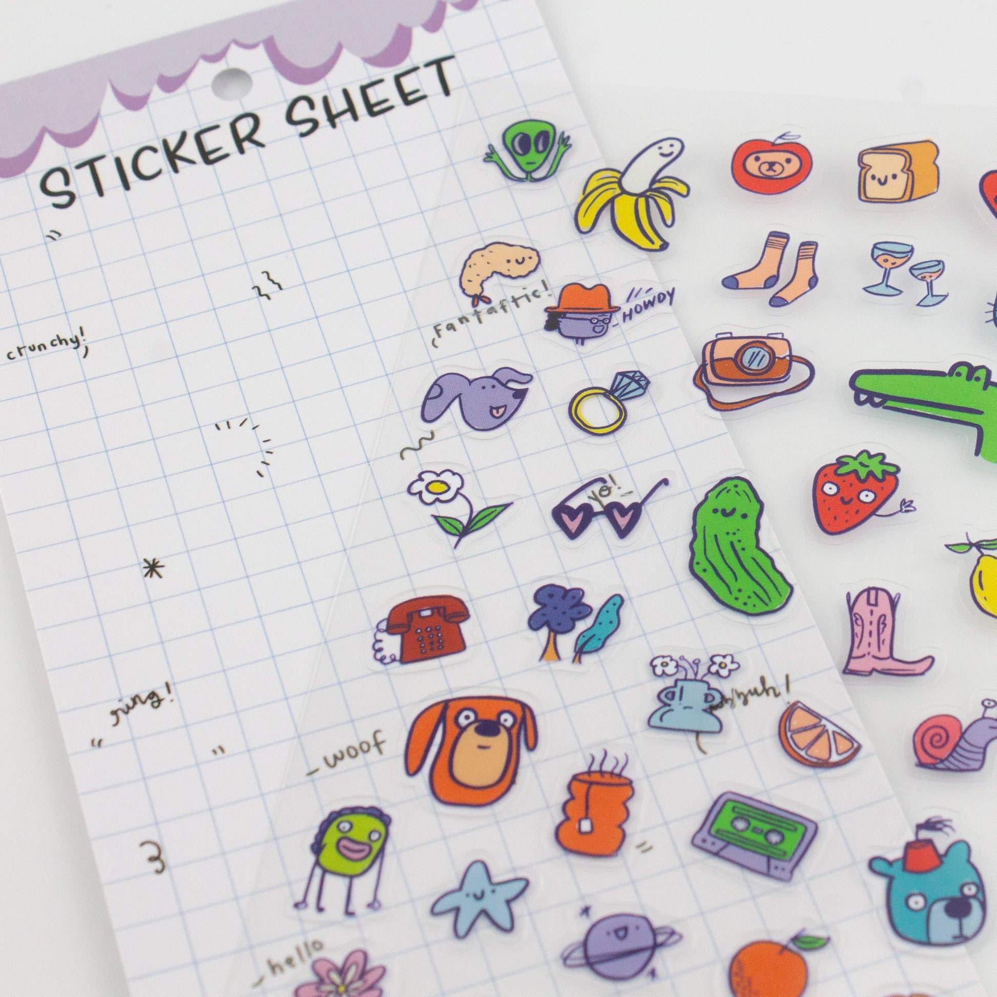 Sticker sheet with various colorful stickers on a grid background