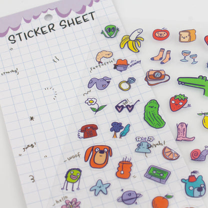 Sticker sheet with various colorful stickers on a grid background