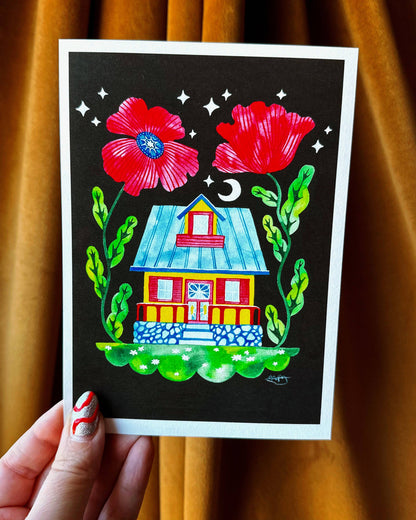 Colorful illustration of a house with flowers held against a brown curtain.