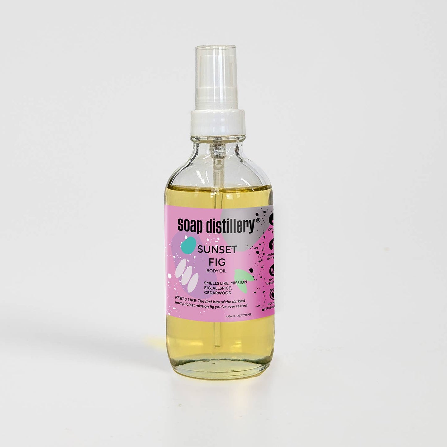 Bottle of Soap Distillery Sunset Fig body oil on a white background