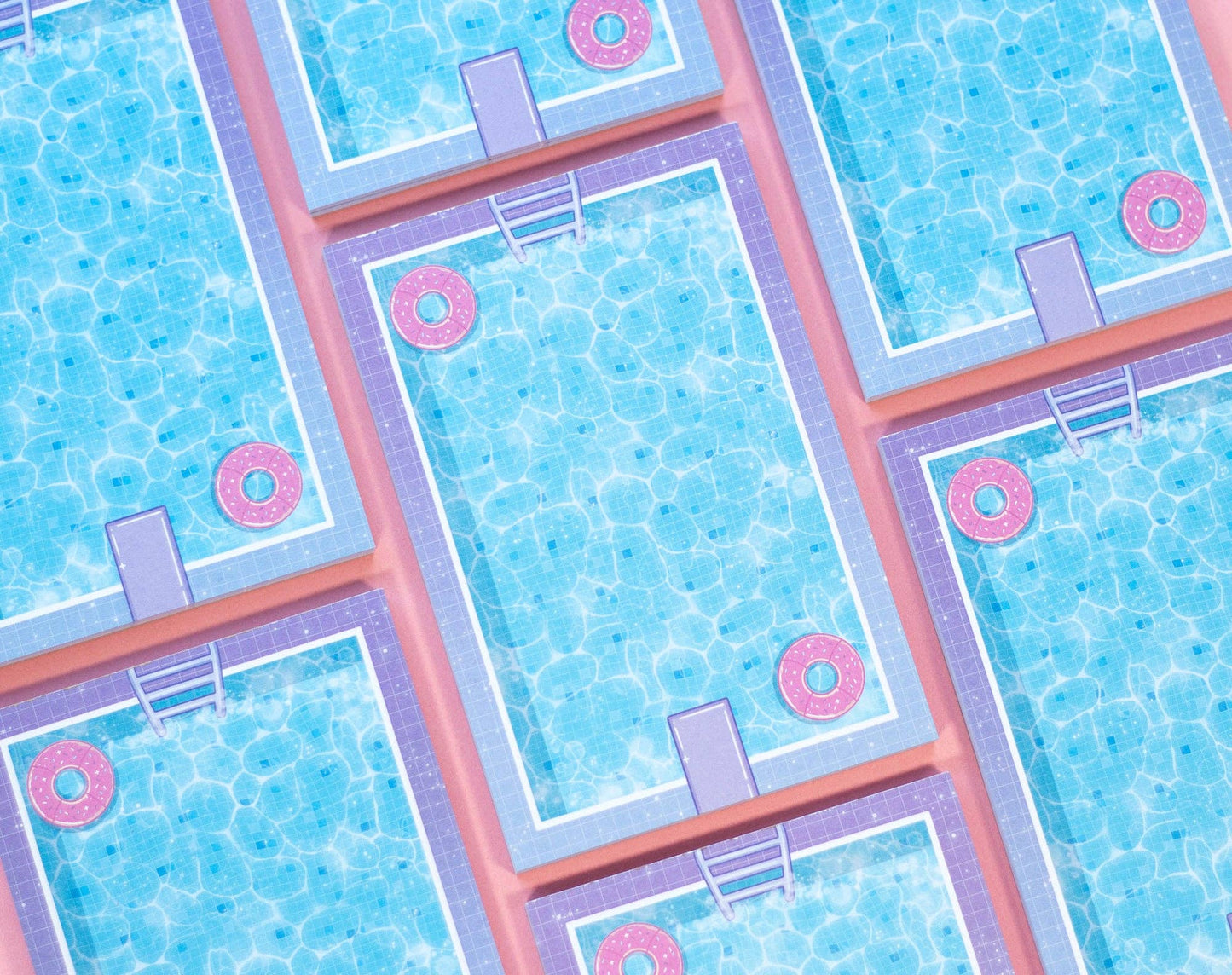 Pattern of pool tiles with pink diving boards and rings on a blue background