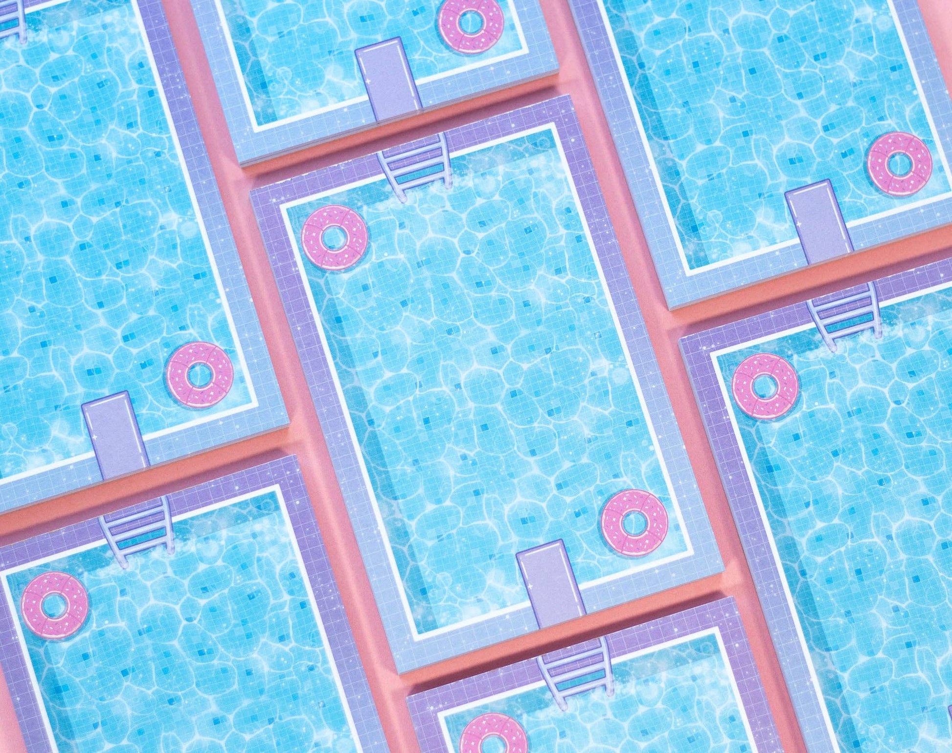 Pattern of pool tiles with pink diving boards and rings on a blue background