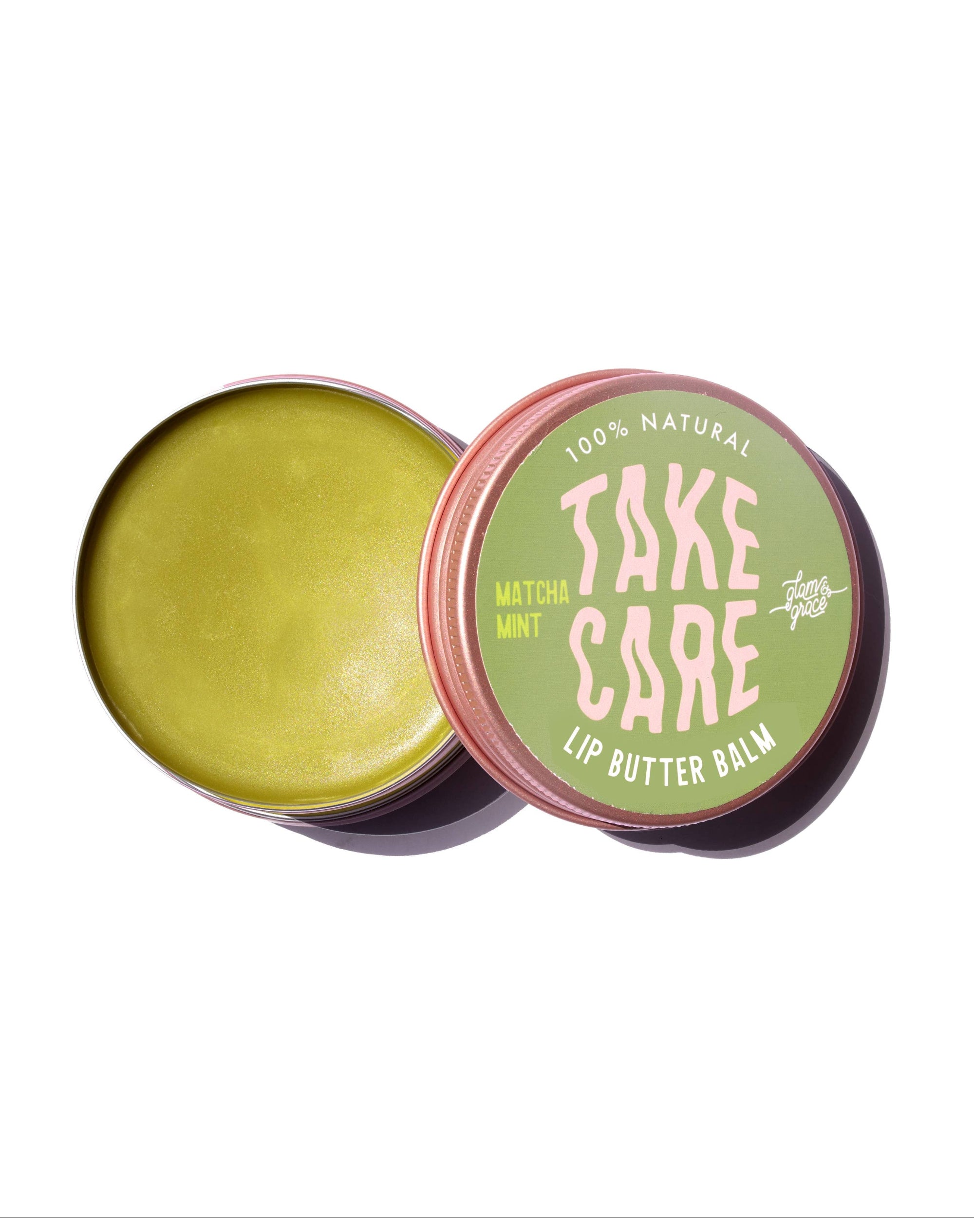 Lip butter balm in a tin with 'Take Care' branding on a white background