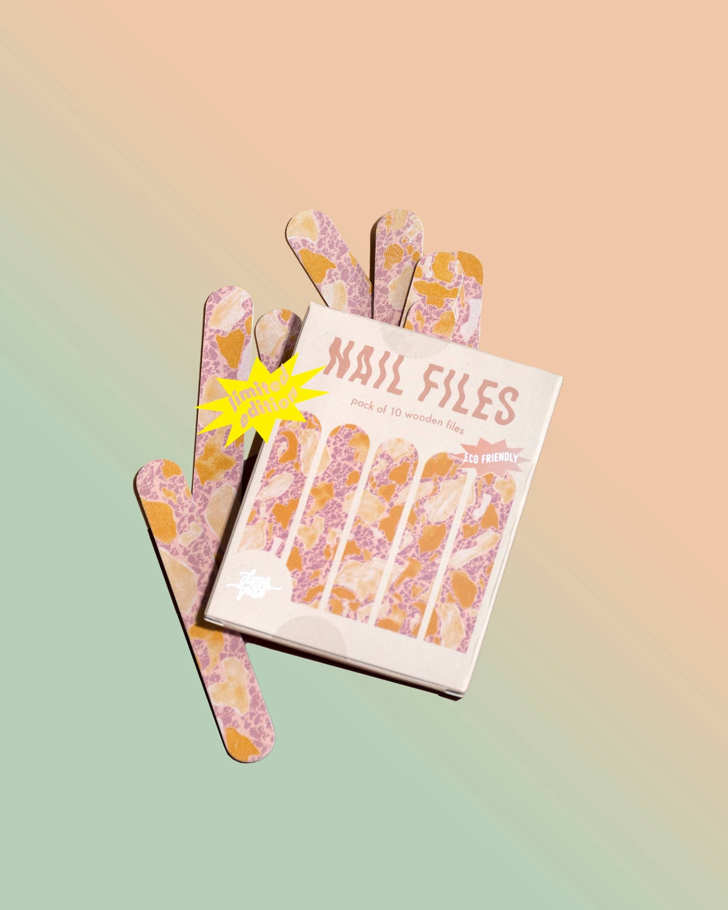 Set of nail files with a decorative cover on a gradient background