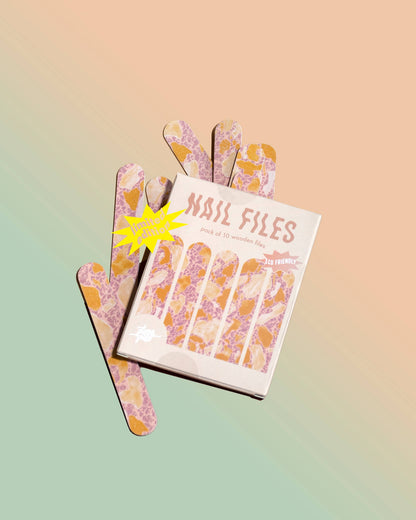 Set of nail files with a decorative cover on a gradient background