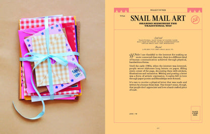 Stack of colorful envelopes tied with a ribbon on a beige background with text about snail mail art.