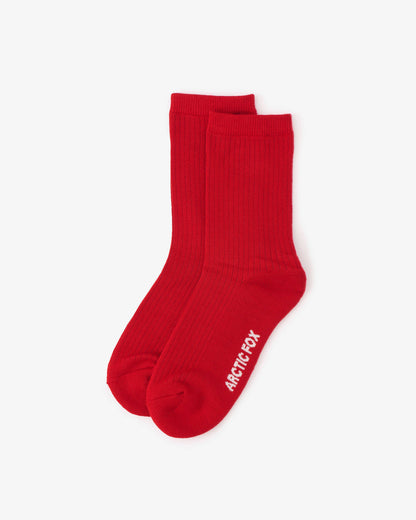 Red socks with a brand logo on a white background