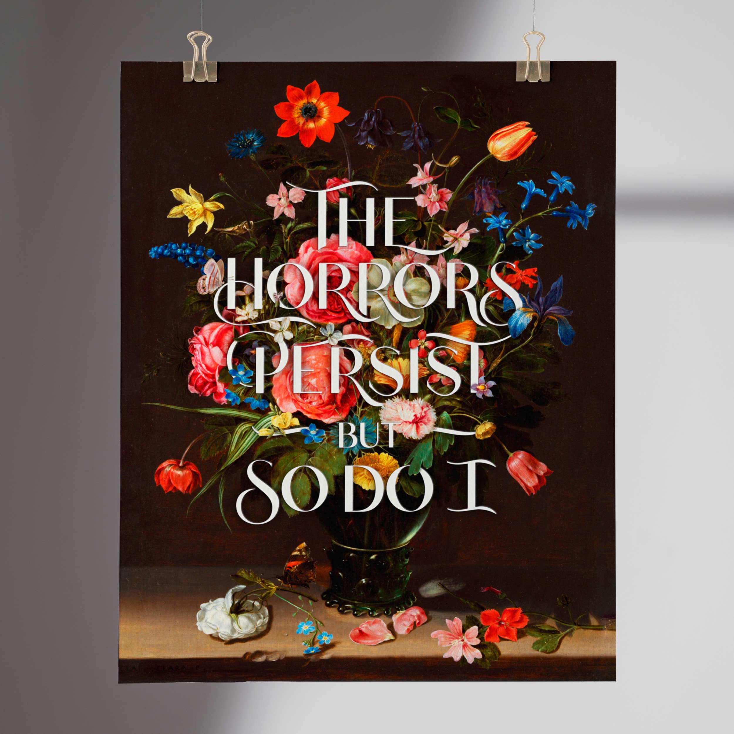 Poster with floral design and text 'The horrors persist but so do I' on a dark background.