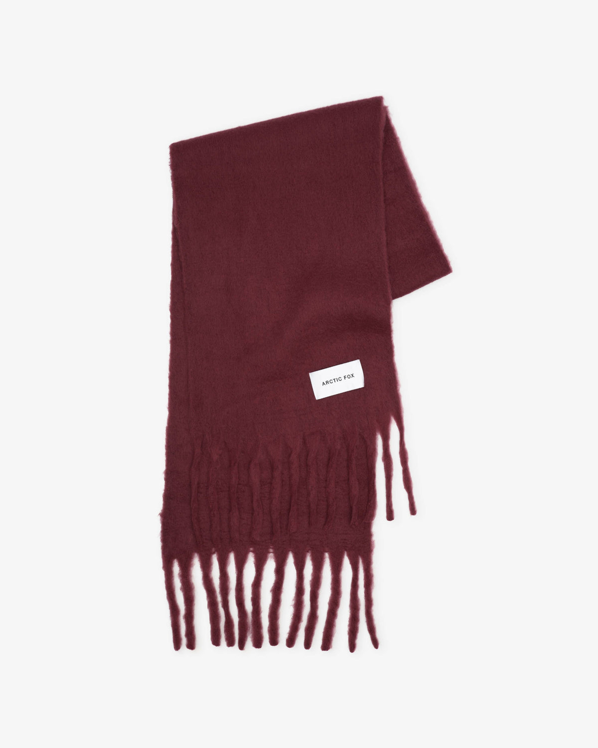 Maroon scarf with fringes on a light gray background