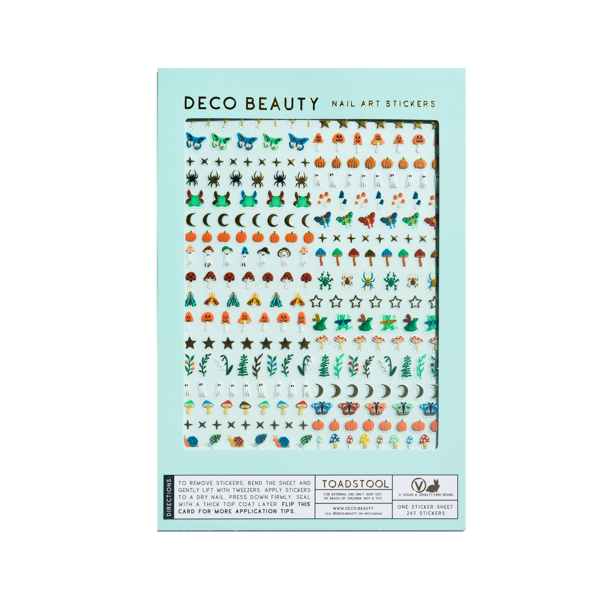 A package of Deco Beauty nail art stickers by Toadstool, featuring a light blue card with rows of colorful decorative stickers including butterflies, pumpkins, moons, stars, and leaves.
