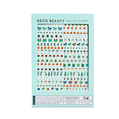 A package of Deco Beauty nail art stickers by Toadstool, featuring a light blue card with rows of colorful decorative stickers including butterflies, pumpkins, moons, stars, and leaves.