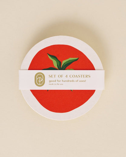 Set of 4 coasters with a red center and green leaves on a beige background