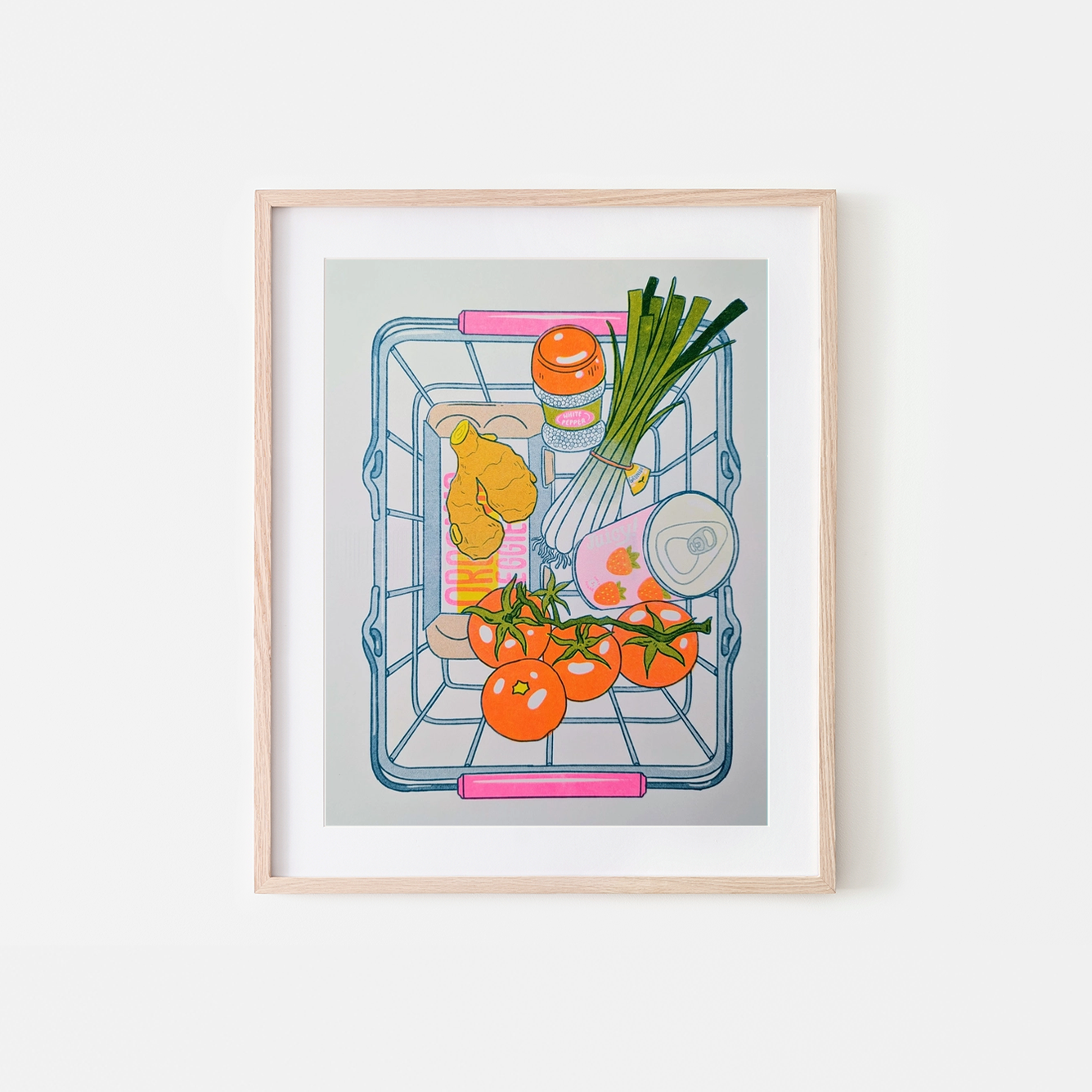 Framed artwork of a shopping cart with groceries on a white background