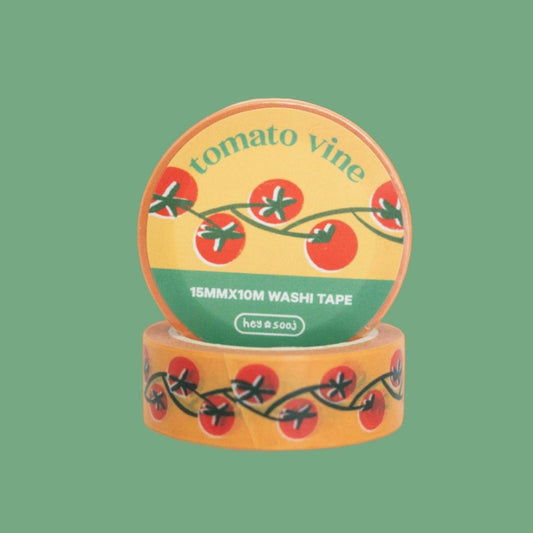 Washi tape with tomato vine design on a green background