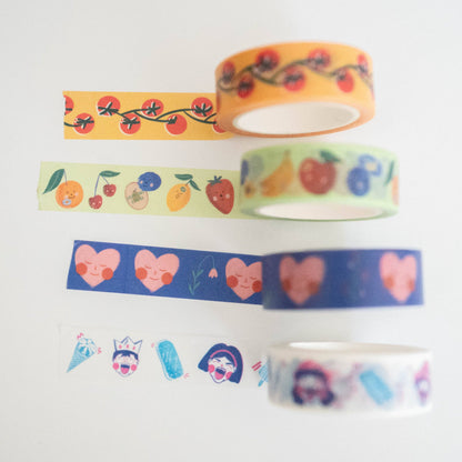 Set of colorful washi tapes with various designs on a white background