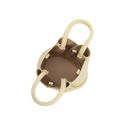 Gold ring holder with a brown center on a white background