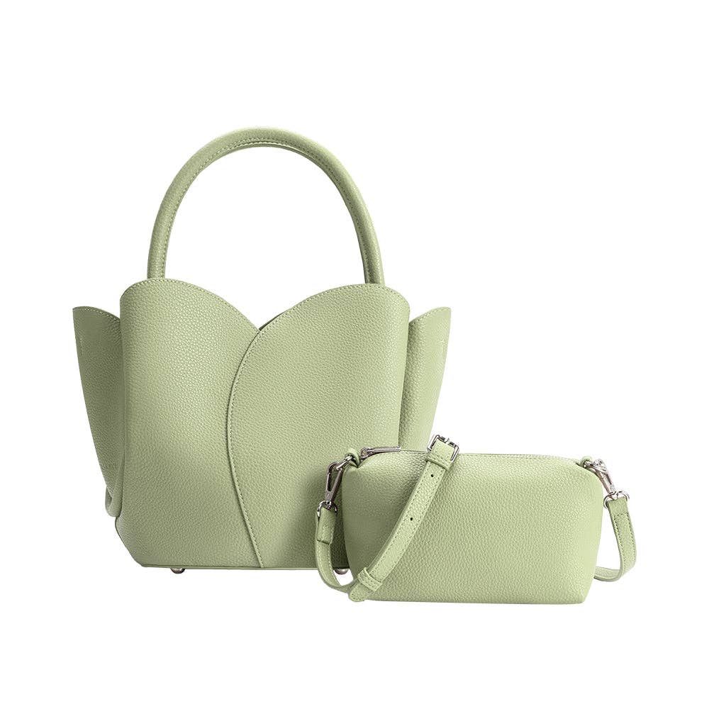 Light green handbag with a matching pouch on a white background