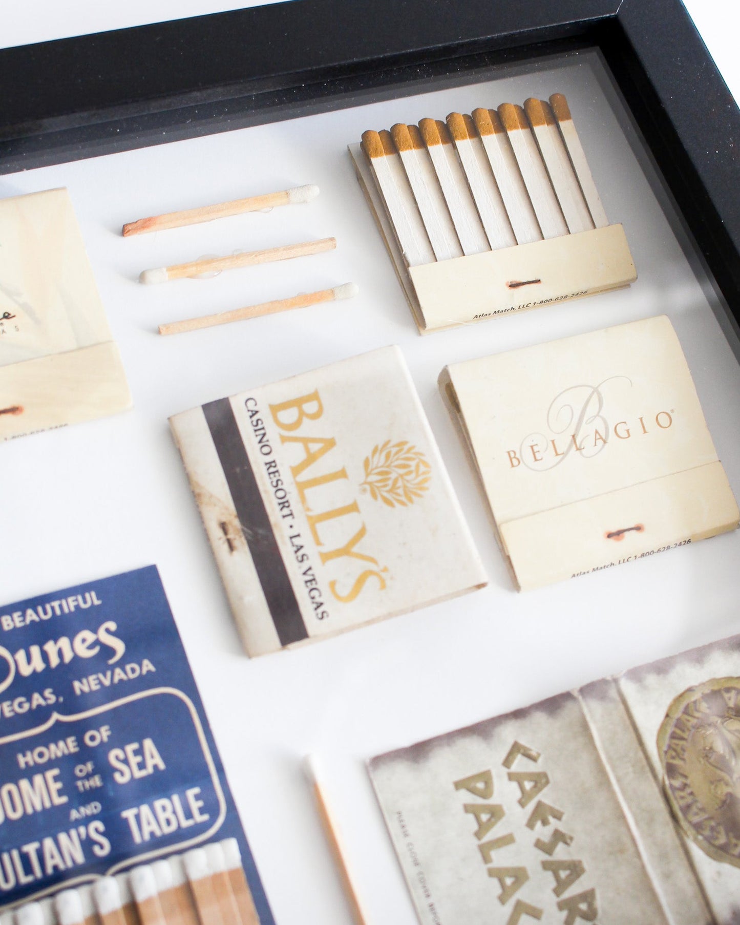 Collection of branded matchbooks with various casinos' names on a white background.