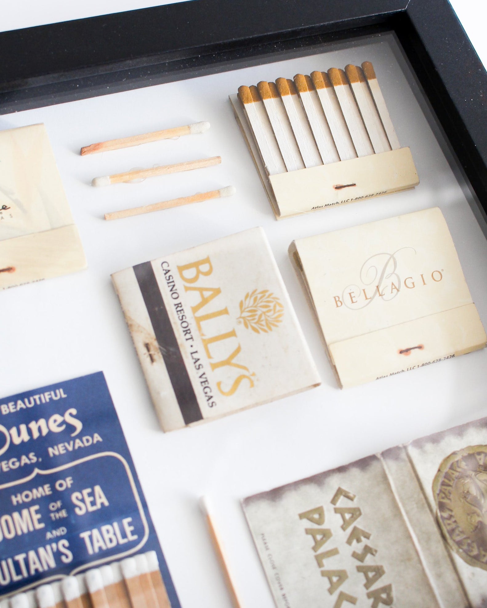 Collection of branded matchbooks with various casinos' names on a white background.