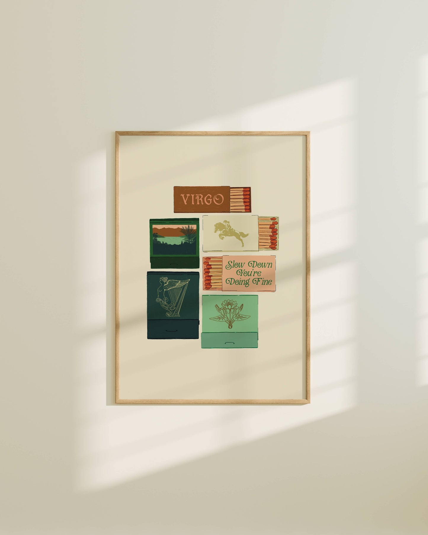Framed artwork with text and symbols on a beige wall