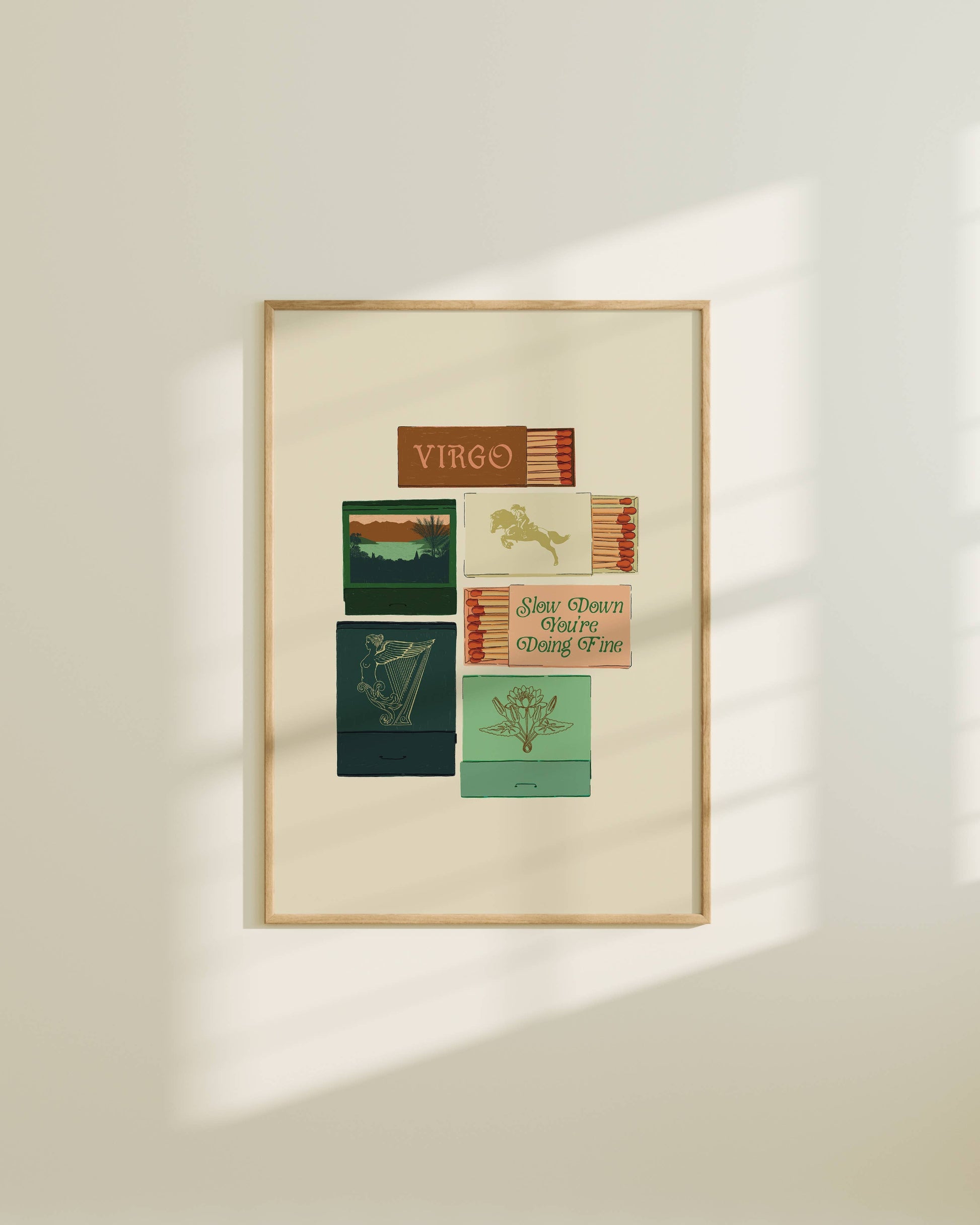 Framed artwork with text and symbols on a beige wall