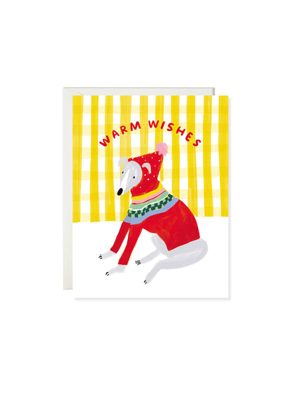 Dog in a red sweater with 'Warm Wishes' text on a yellow striped background