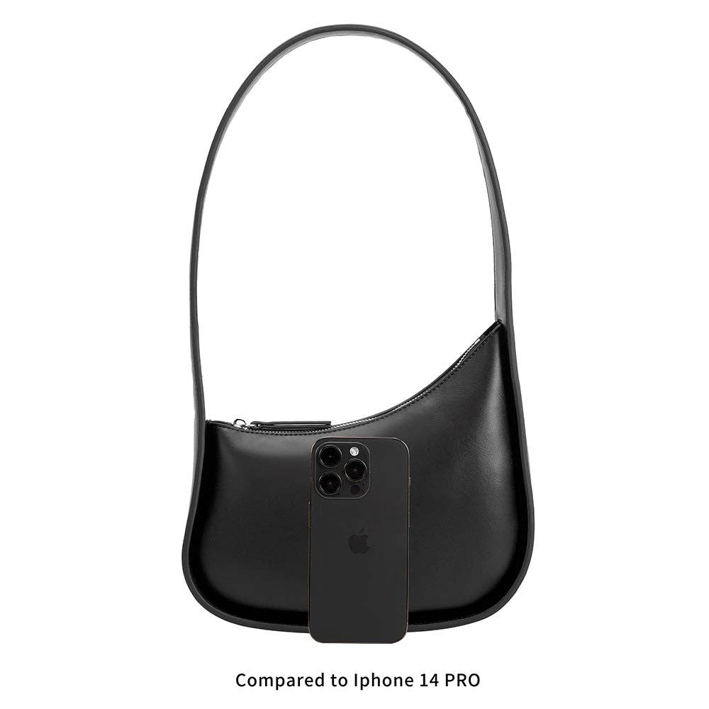 Black handbag with an iPhone 14 Pro inside, on a white background Willow Shoulder Bag Melie Bianco
