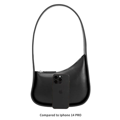 Black handbag with an iPhone 14 Pro inside, on a white background Willow Shoulder Bag Melie Bianco