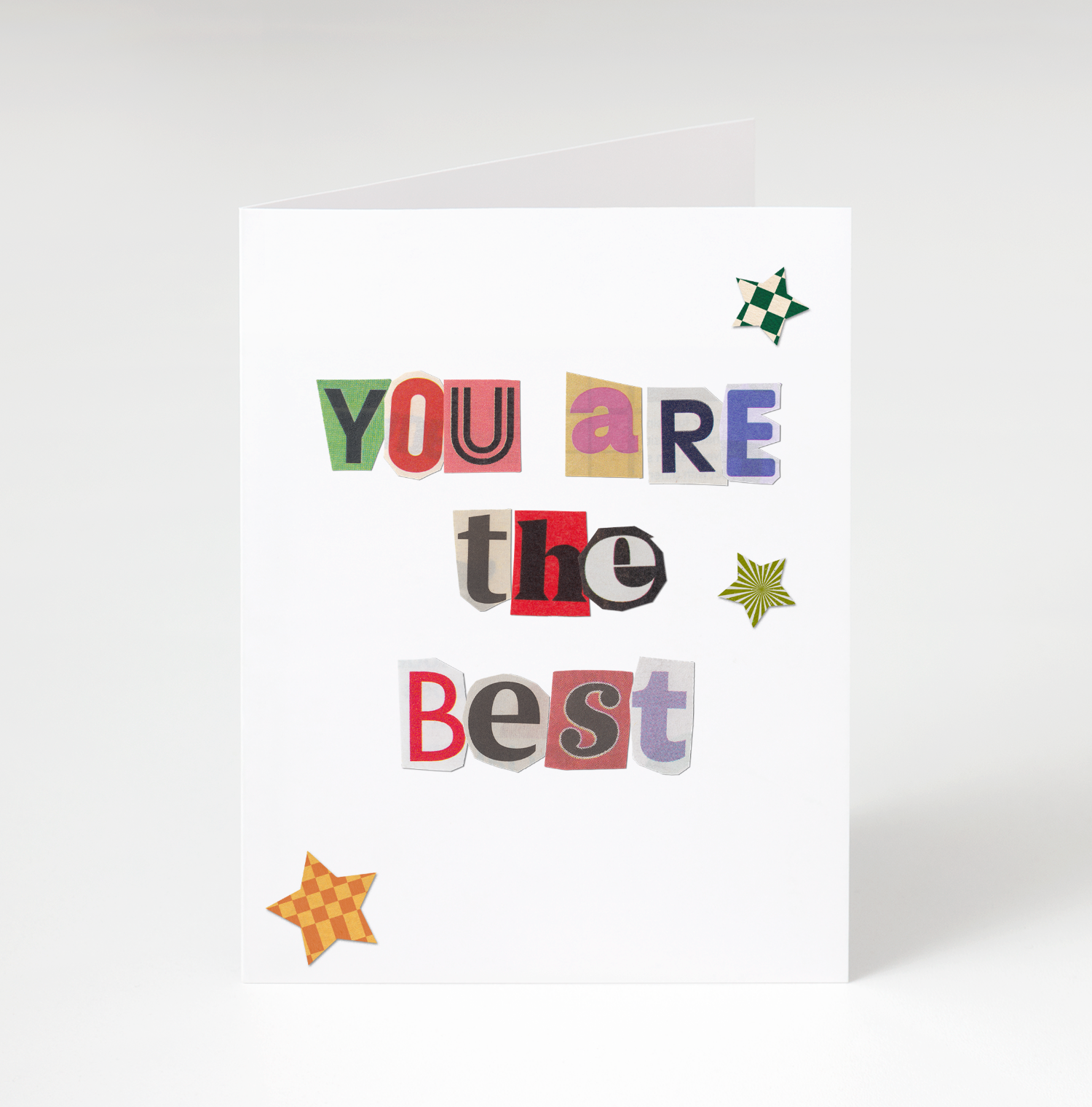 Card with colorful cut-out letters spelling 'YOU ARE THE BEST' on a white background