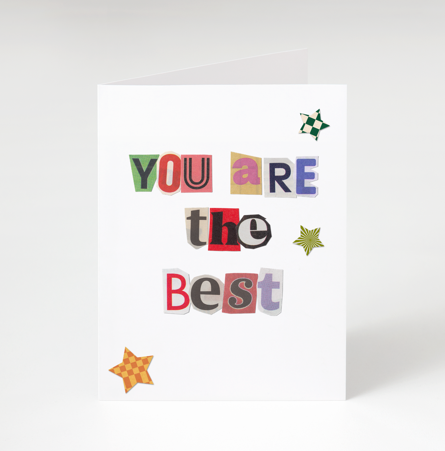 Card with colorful cut-out letters spelling 'YOU ARE THE BEST' on a white background